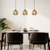 chique_lichts_hanglamp_zw_4.webp Clearance Straluma Chique 3-lichts hanglamp zwart/goud met amber glas