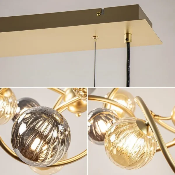 grote_hanglamp_goud_met_a_3.webp Best Straluma Grote hanglamp goud met amber/smoke glazen bollen