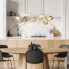 grote_hanglamp_goud_met_a_4.webp Best Straluma Grote hanglamp goud met amber/smoke glazen bollen