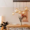 grote_lichts_eettafelhang_4.webp Clearance Straluma Grote 6-lichts eettafelhanglamp messing met amber glazen bollen