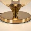 kleine_tafellamp_goud_met_2.webp Online Straluma Kleine tafellamp goud met amber kleurig glas