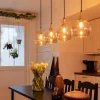 lichts_eettafelhanglamp_z_4-1.webp Hot Straluma 4-Lichts eettafelhanglamp zwart/goud met amber glazen bollen