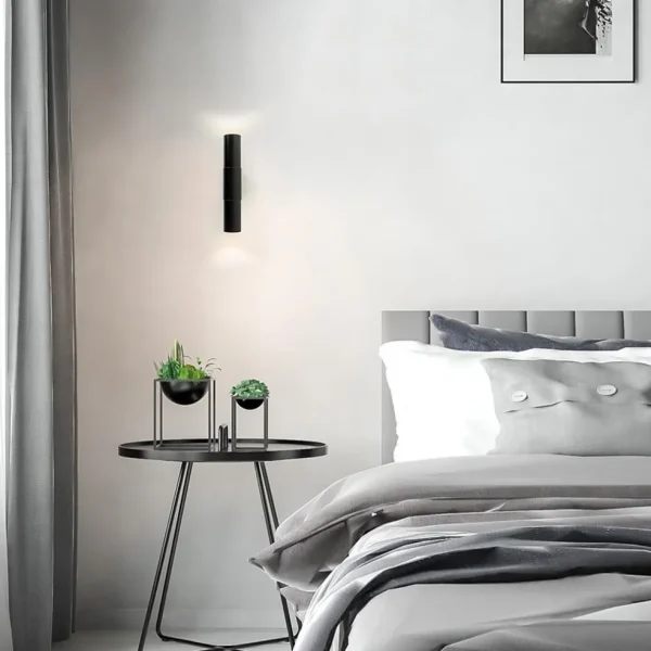 mat_zwarte_cilinder_wandl_4.webp Outlet Straluma Mat zwarte cilinder wandlamp up+down