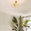 plafondlamp_goud_met_ambe_4.webp Clearance Straluma Plafondlamp goud met amber glazen bol 30 cm