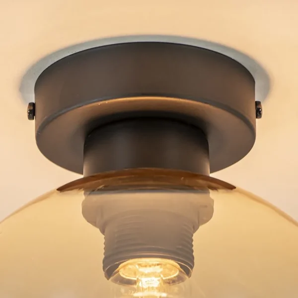 plafondlamp_zwart_met_amb_2.webp Discount Straluma Plafondlamp zwart met amber glas 20 cm